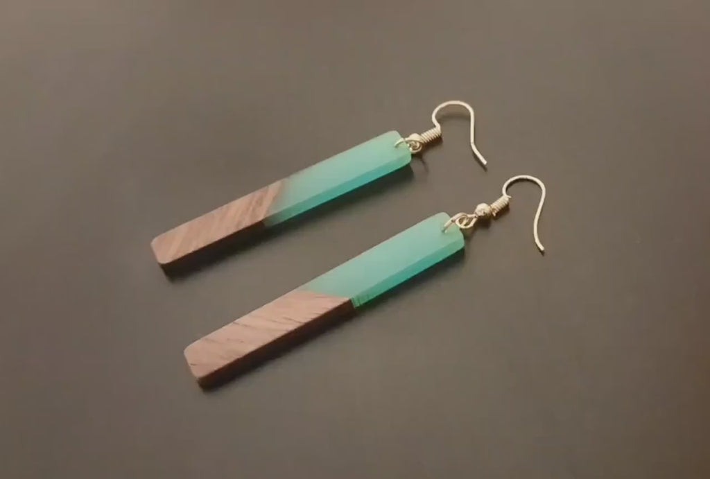 Gold-transparent wooden earrings in the form of long rods, walnut wood, resin and gold foil, handmade earrings, Germany, 7 cm, new