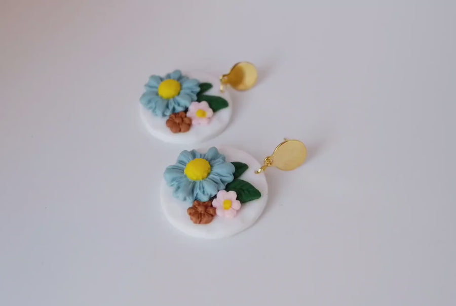 White, round polymerclay earrings with colorful flowers (light blue, pink), ver. golden studs, handmade, Germany, 4 cm, creamy white