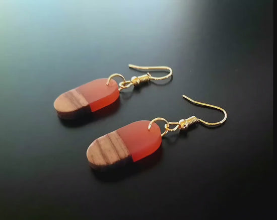 Orange-brown wooden earrings, oval earrings made of walnut wood and orange synthetic resin, handmade earrings from manufactory in Germany, 3 cm