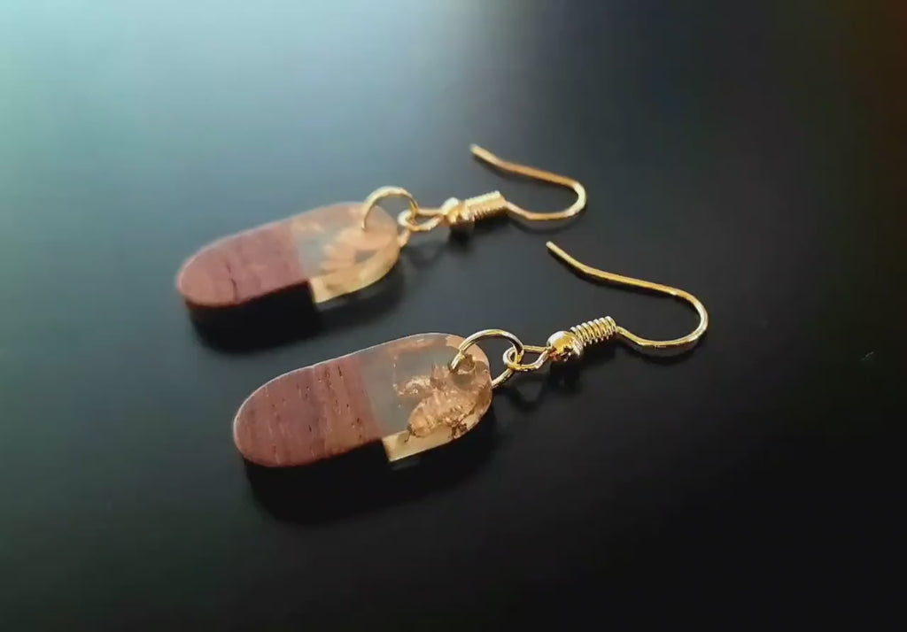 Golden wooden earrings, oval hanging earrings made of walnut wood, transparent synthetic resin and gold foil, handmade earrings, Germany, 3 cm