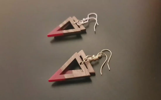 Red-brown wooden earrings, shape of triangles with hole, walnut wood and synthetic resin, new, handmade earrings from Germany, 4 cm, red