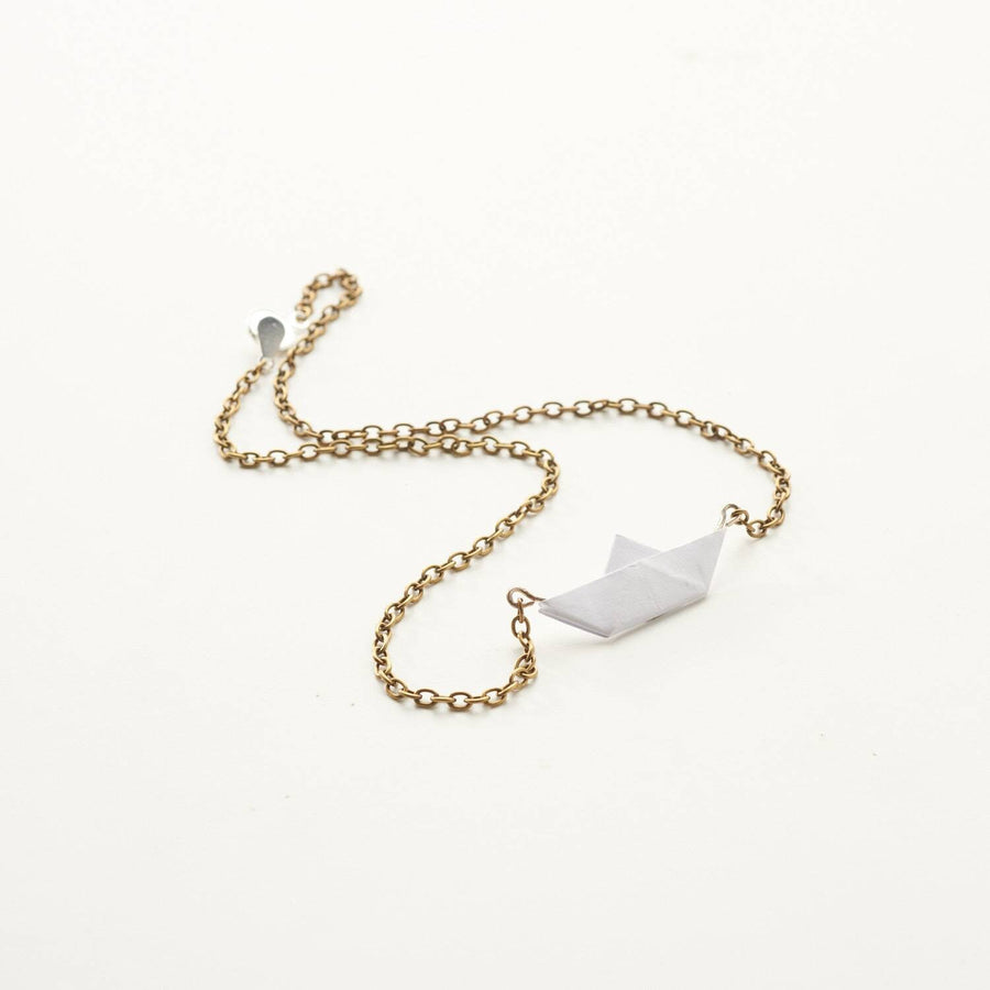 White and gold paper chain, bronze link chain with folded paper boat in white and gold sail. Handmade from Germany