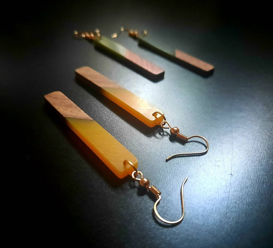 Yellow-brown wooden earrings in the form of long sticks, made of walnut wood and yellow synthetic resin, handmade earrings, Germany, 7 cm, new