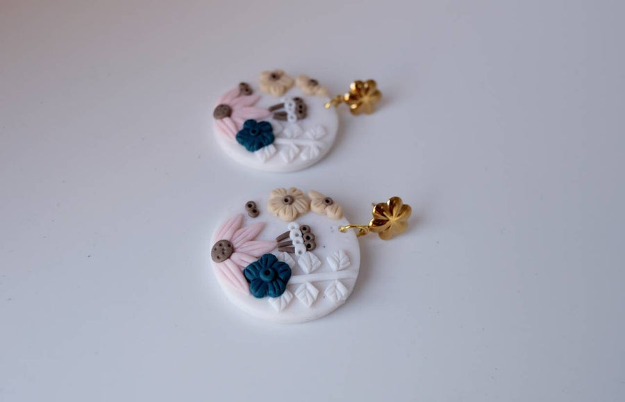 White, round polymerclay earrings with colorful flowers (yellow, blue, pink), ver. golden studs, handmade, Germany, 4 cm, creamy white