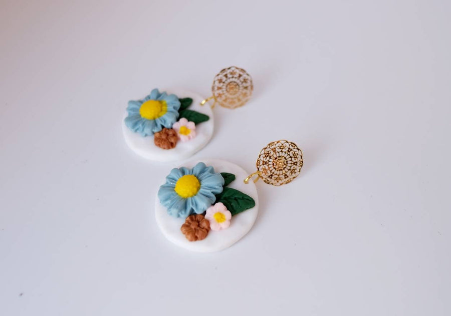 White, round polymerclay earrings with colorful flowers (light blue, pink), ver. golden studs, handmade, Germany, 4 cm, creamy white