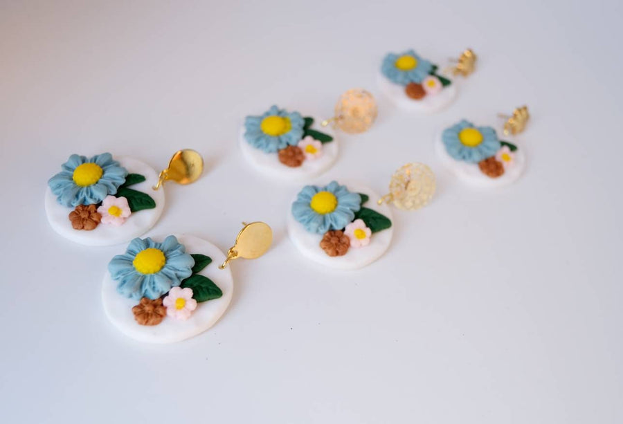 White, round polymerclay earrings with colorful flowers (light blue, pink), ver. golden studs, handmade, Germany, 4 cm, creamy white