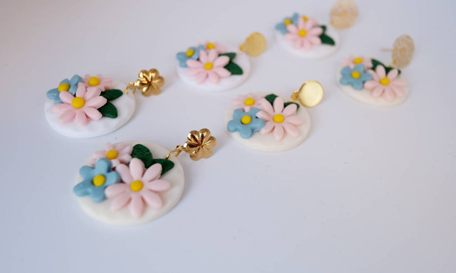 White, round polymerclay earrings with colorful flowers (light blue, pale pink), golden studs, handmade, Germany, 4 cm, creamy white