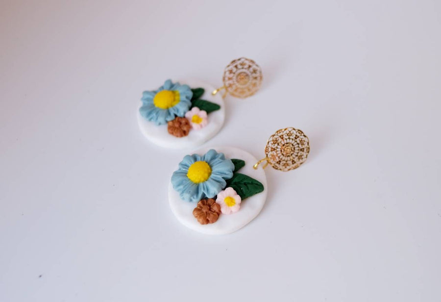 White, round polymerclay earrings with colorful flowers (light blue, pink), ver. golden studs, handmade, Germany, 4 cm, creamy white