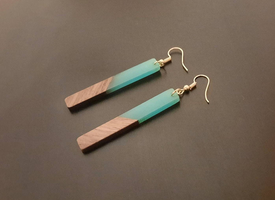 Black-brown wooden earrings in the form of long rods, made of walnut wood and black synthetic resin, handmade earrings, Germany, 7 cm