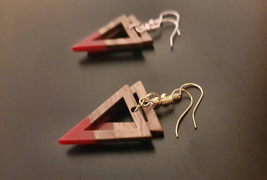 Red-brown wooden earrings, shape of triangles with hole, walnut wood and synthetic resin, new, handmade earrings from Germany, 4 cm, red