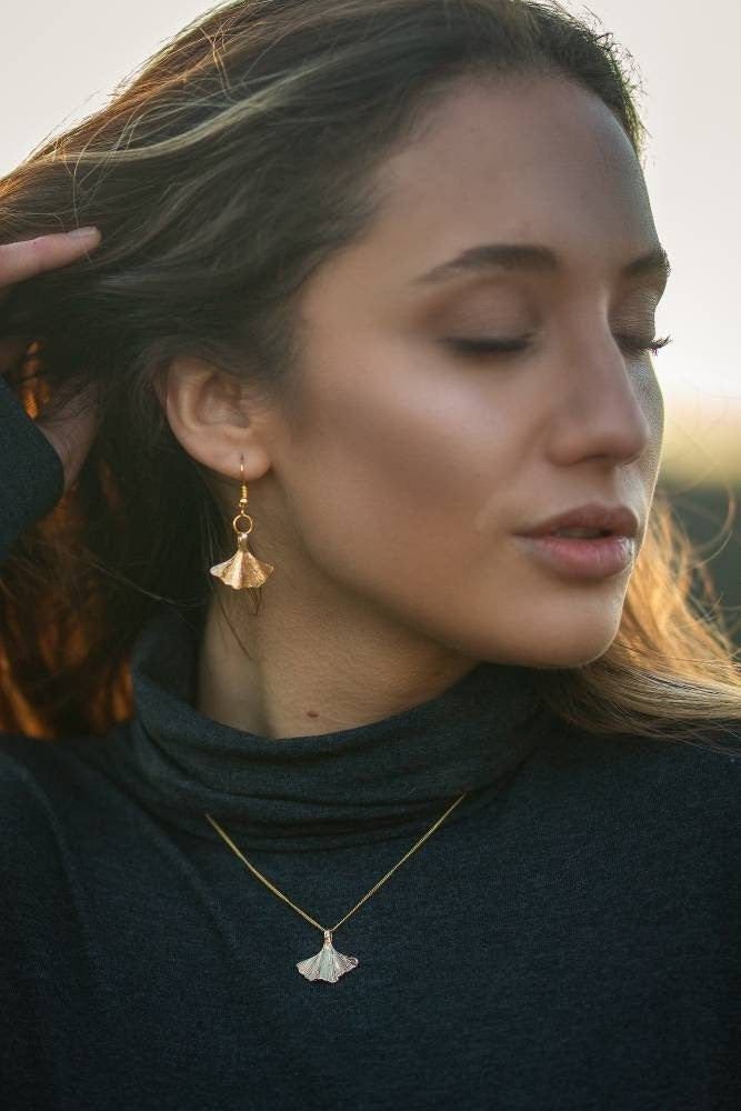 Jewelry set with golden ginkgo leaf, gold-plated hanging earrings and necklace with filigree gingko leaf, yellow gold gold plated, Germany