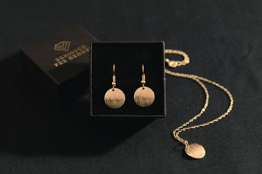 Yellow gold earrings with minimalist plate, golden hanging earrings with delicate, brushed circle as pendants, yellow gold plated