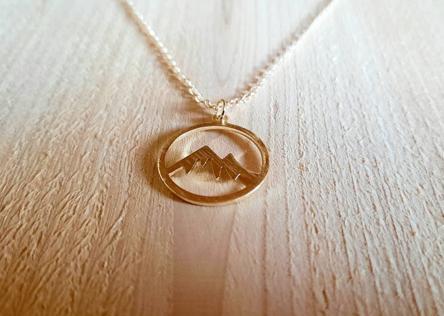 Jewelry set mountains in gold, gold earrings and necklace with round pendant with mountains, brushed circle in yellow gold gold-plated, handmade