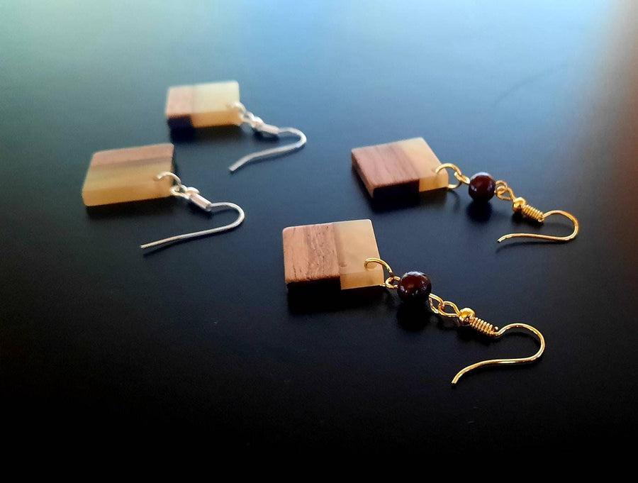 Gold-transparent wooden earrings in the form of long rods, walnut wood, resin and gold foil, handmade earrings, Germany, 7 cm, new